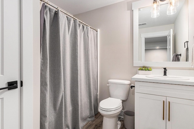 1014 Castlebay Way Unit 8, Hudsonville, MI 49426 - full bath with vanity, wood finished floors, and a shower with shower curtain