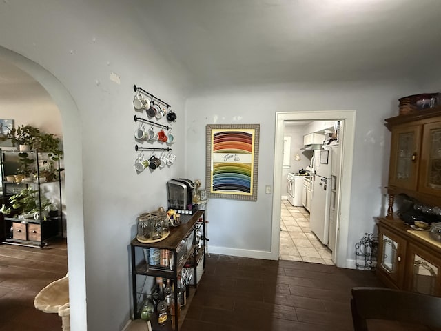 26 Edna Ave, Pontiac, MI 48341 - corridor with arched walkways and light wood finished floors