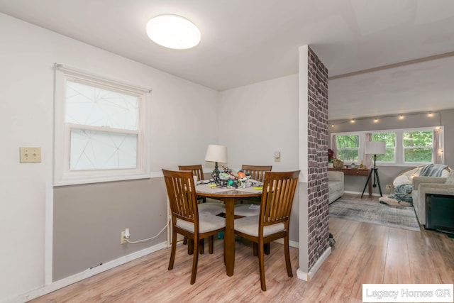 961 Dolphin St SW Unit 013, Wyoming, MI 49509 - dining room featuring wood finished floors and baseboards