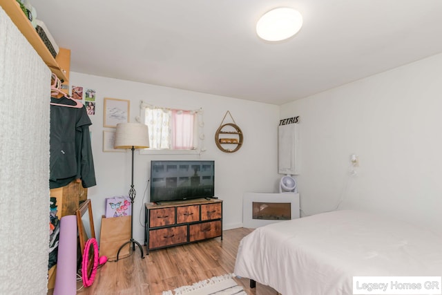 961 Dolphin St SW Unit 013, Wyoming, MI 49509 - bedroom with wood finished floors