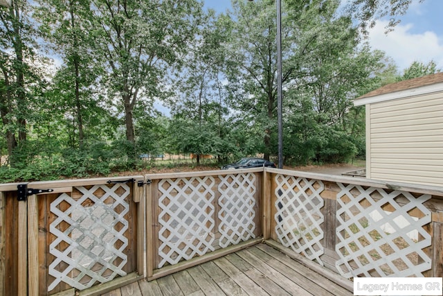 961 Dolphin St SW Unit 013, Wyoming, MI 49509 - deck with view of scattered trees
