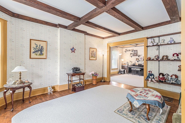 449 4th St, Manistee, MI 49660 - bedroom featuring wood finished floors, beam ceiling, coffered ceiling, and wallpapered walls