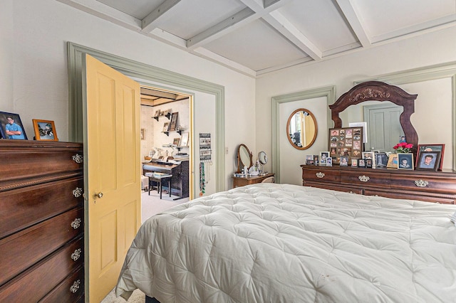 449 4th St, Manistee, MI 49660 - carpeted bedroom with beamed ceiling