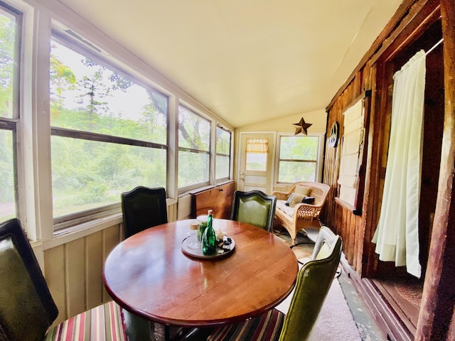 2031 E Oak St, Newaygo, MI 49337 - sunroom / solarium with lofted ceiling, plenty of natural light, and outdoor dining space