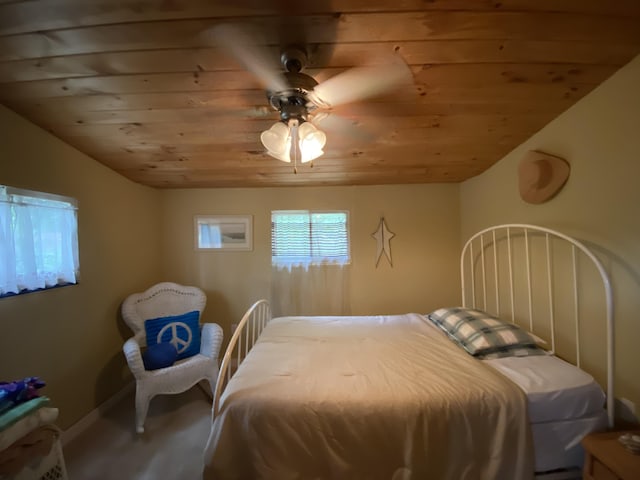 2031 E Oak St, Newaygo, MI 49337 - bedroom with wooden ceiling, vaulted ceiling, and ceiling fan