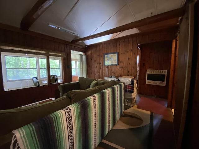 2031 E Oak St, Newaygo, MI 49337 - living room featuring heating unit, wood walls, and beamed ceiling