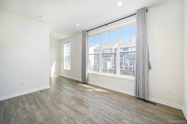 2965 Aughton Rd, Ann Arbor, MI 48105 - spare room featuring wood finished floors, recessed lighting, and a smoke detector