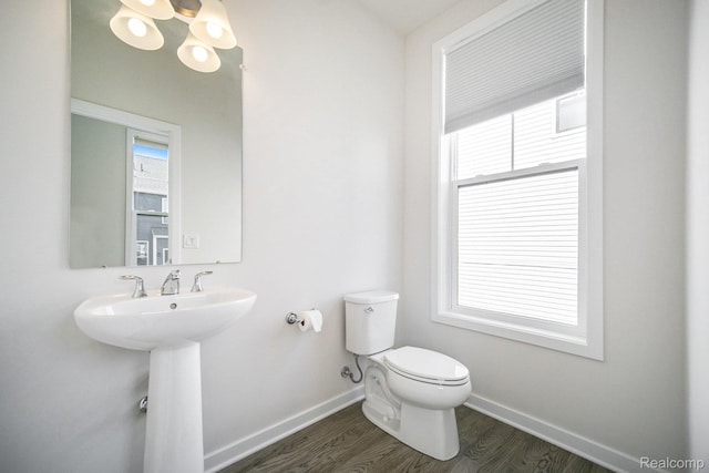 2965 Aughton Rd, Ann Arbor, MI 48105 - bathroom featuring wood finished floors and a chandelier