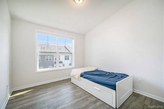 2965 Aughton Rd, Ann Arbor, MI 48105 - bedroom featuring wood finished floors and vaulted ceiling