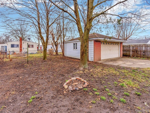 33855 Cherry Hill Rd, Westland, MI 48186 - view of yard featuring a garage and an outdoor structure