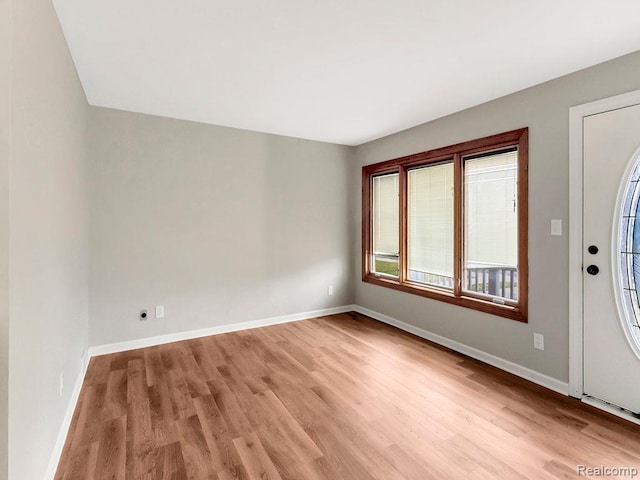 33855 Cherry Hill Rd, Westland, MI 48186 - foyer entrance featuring light wood-type flooring and baseboards