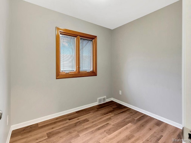 33855 Cherry Hill Rd, Westland, MI 48186 - spare room with light wood-type flooring and baseboards