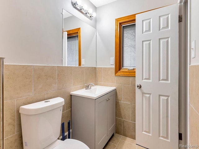 33855 Cherry Hill Rd, Westland, MI 48186 - bathroom featuring vanity, tile walls, and tile patterned flooring