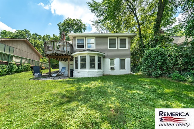9420 Van Antwerp Rd, Brighton, MI 48116 - back of house featuring a patio, a yard, a wooden deck, and a chimney