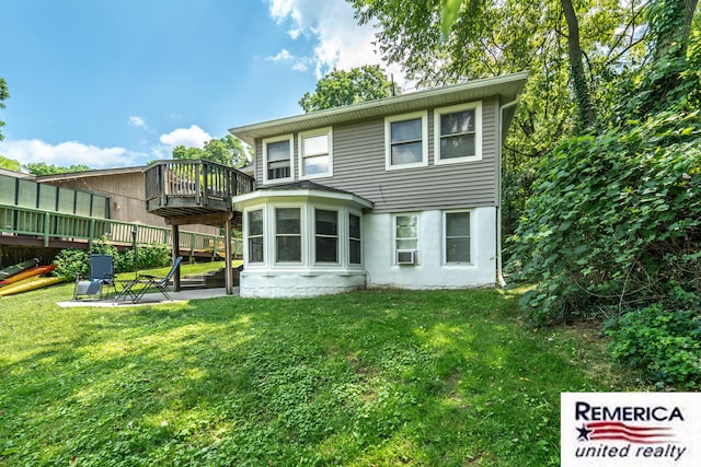 9420 Van Antwerp Rd, Brighton, MI 48116 - rear view of property featuring a lawn, a patio area, cooling unit, and a wooden deck