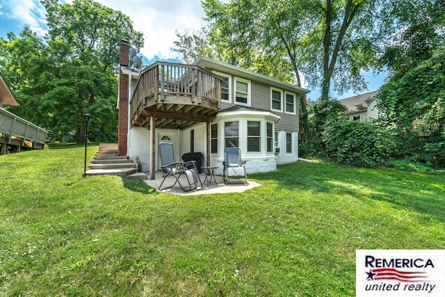 9420 Van Antwerp Rd, Brighton, MI 48116 - back of house featuring a patio area, a yard, a wooden deck, and a chimney