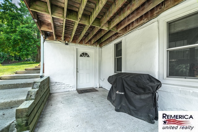 9420 Van Antwerp Rd, Brighton, MI 48116 - view of exterior entry with stucco siding