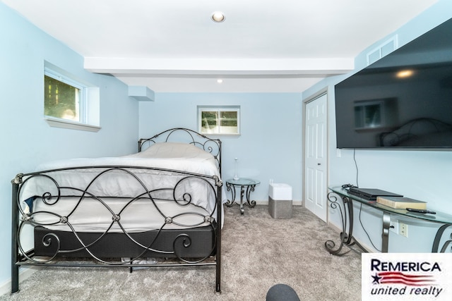 9420 Van Antwerp Rd, Brighton, MI 48116 - bedroom featuring beam ceiling, carpet, a closet, multiple windows, and recessed lighting