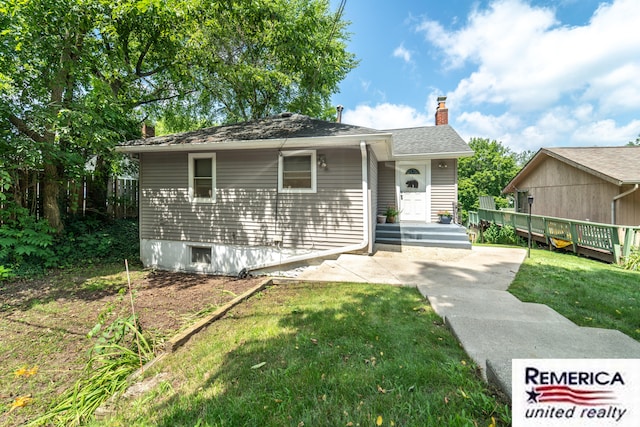 9420 Van Antwerp Rd, Brighton, MI 48116 - bungalow-style home featuring a chimney and a front lawn