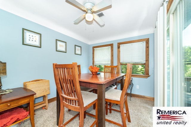 9420 Van Antwerp Rd, Brighton, MI 48116 - carpeted dining room featuring baseboards and a ceiling fan