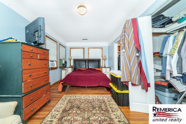 9420 Van Antwerp Rd, Brighton, MI 48116 - bedroom with wood finished floors