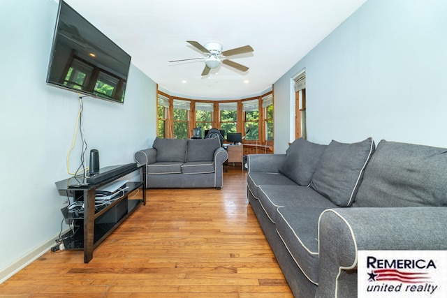 9420 Van Antwerp Rd, Brighton, MI 48116 - living room with ceiling fan and light wood-style floors