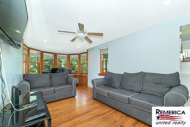 9420 Van Antwerp Rd, Brighton, MI 48116 - living room with wood finished floors, a ceiling fan, and recessed lighting