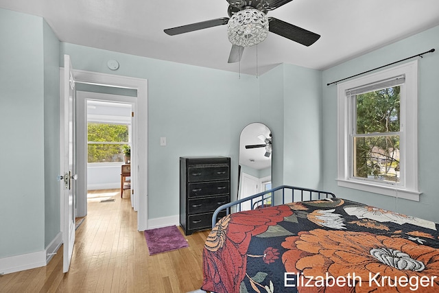 1215 Emerald Ave NE, Grand Rapids, MI 49505 - bedroom with light wood-style flooring and a ceiling fan