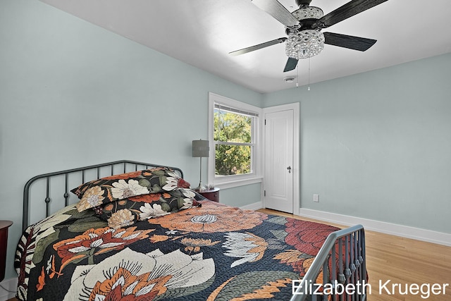 1215 Emerald Ave NE, Grand Rapids, MI 49505 - bedroom featuring wood finished floors and a ceiling fan