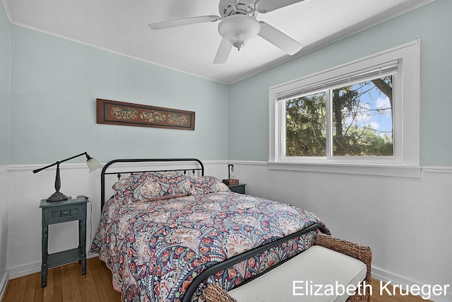 1215 Emerald Ave NE, Grand Rapids, MI 49505 - bedroom featuring wood-type flooring, crown molding, and a ceiling fan