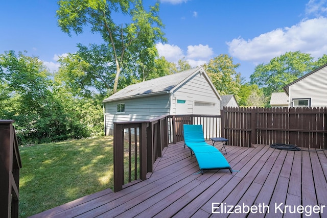 1215 Emerald Ave NE, Grand Rapids, MI 49505 - wooden terrace with a lawn and an outbuilding