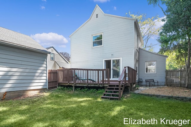 1215 Emerald Ave NE, Grand Rapids, MI 49505 - rear view of property featuring a wooden deck