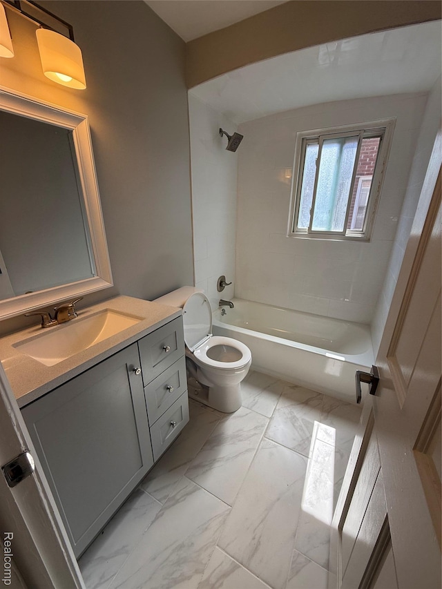 19612 Gaukler St, Saint Clair Shores, MI 48080 - full bath with marble look tiles, vanity, and bathing tub / shower combination