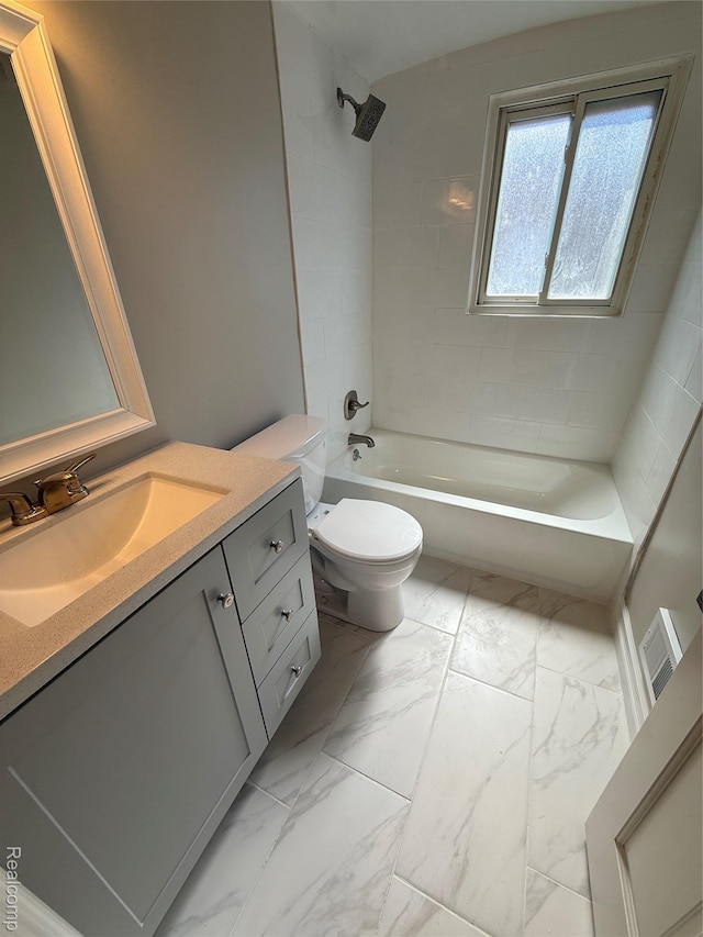 19612 Gaukler St, Saint Clair Shores, MI 48080 - bathroom featuring marble look tiles, vanity, and shower / bathtub combination