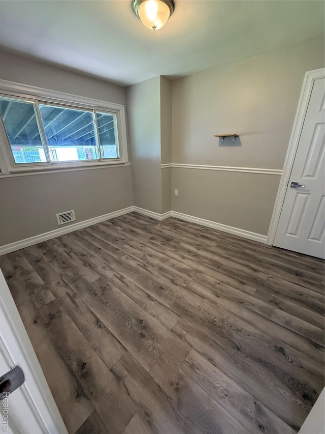 19612 Gaukler St, Saint Clair Shores, MI 48080 - unfurnished bedroom featuring dark wood finished floors and baseboards