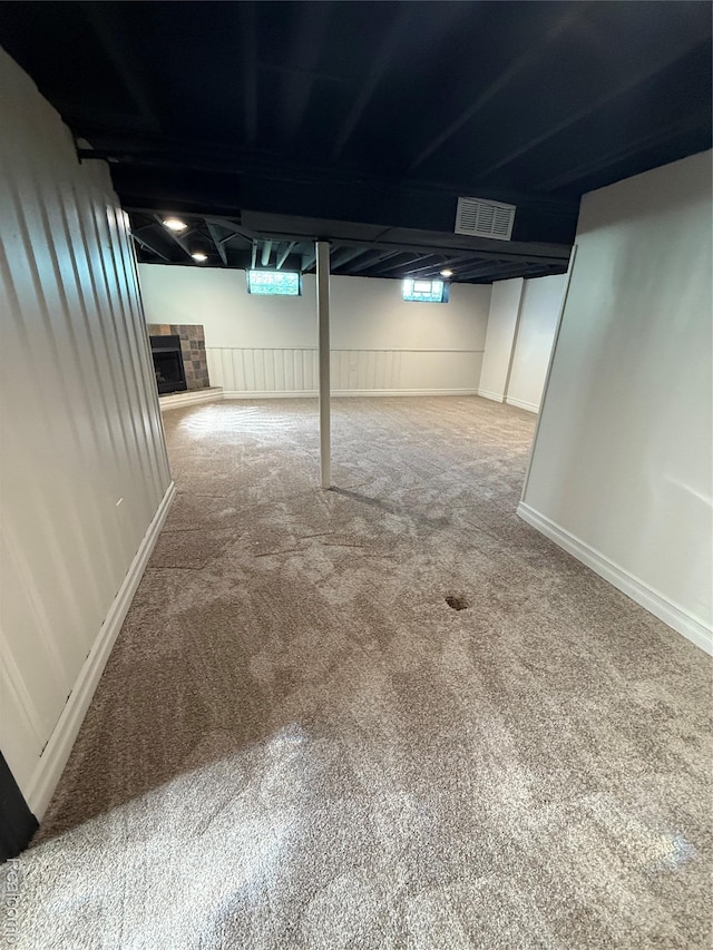 19612 Gaukler St, Saint Clair Shores, MI 48080 - basement with carpet and a tile fireplace