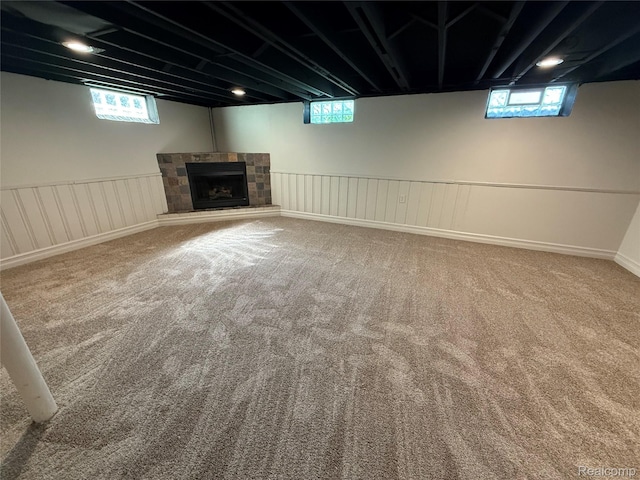 19612 Gaukler St, Saint Clair Shores, MI 48080 - below grade area with carpet flooring, healthy amount of natural light, and a tile fireplace