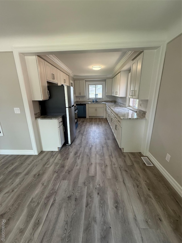 19612 Gaukler St, Saint Clair Shores, MI 48080 - kitchen featuring dishwashing machine, dark wood finished floors, and crown molding
