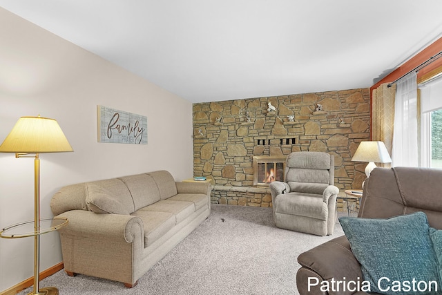 4707 Cannonsburg Rd NE, Belmont, MI 49306 - carpeted living area featuring a stone fireplace