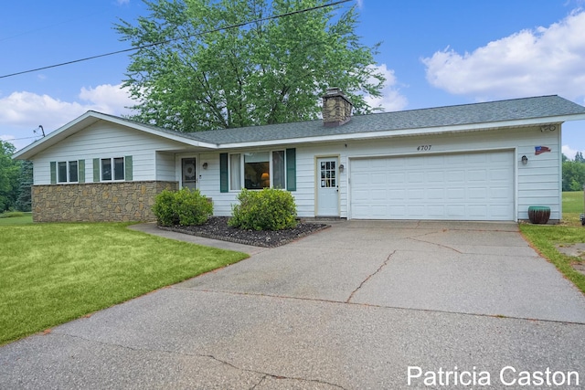 4707 Cannonsburg Rd NE, Belmont, MI 49306 - ranch-style house featuring concrete driveway, a front lawn, a chimney, an attached garage, and stone siding