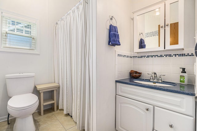 432 Spaulding Dr, Coldwater, MI 49036 - full bathroom featuring vanity, tasteful backsplash, curtained shower, and tile patterned floors