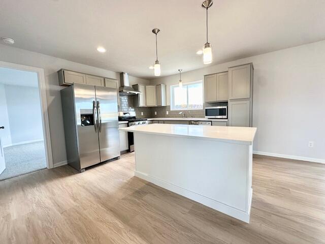 LOT100 Wren Dr SE, Caledonia, MI 49316 - kitchen featuring stainless steel appliances, gray cabinets, light wood-style flooring, light countertops, and recessed lighting