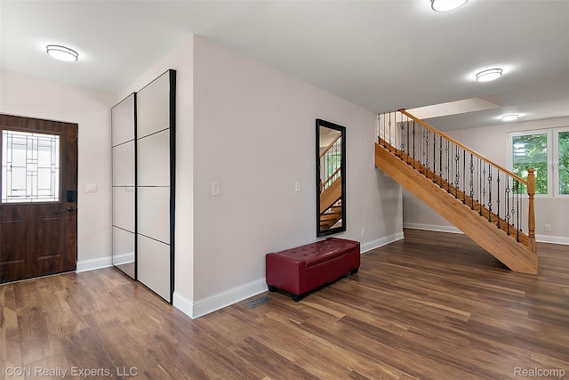 6727 Napier Rd, Plymouth, MI 48170 - entryway featuring stairs and wood finished floors