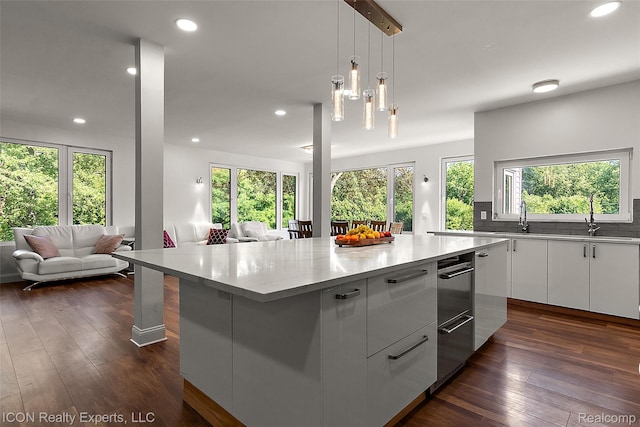 6727 Napier Rd, Plymouth, MI 48170 - kitchen featuring open floor plan, white cabinets, modern cabinets, a large island, and recessed lighting