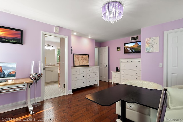 6727 Napier Rd, Plymouth, MI 48170 - living room featuring dark wood-style floors and a chandelier
