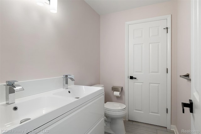 6727 Napier Rd, Plymouth, MI 48170 - bathroom with toilet and vanity
