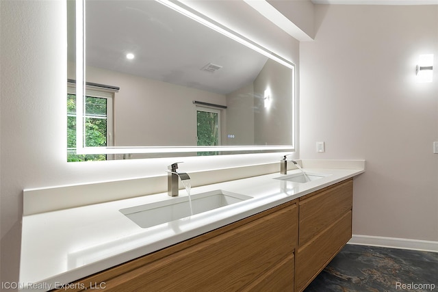 6727 Napier Rd, Plymouth, MI 48170 - full bathroom with double vanity and stone finish flooring