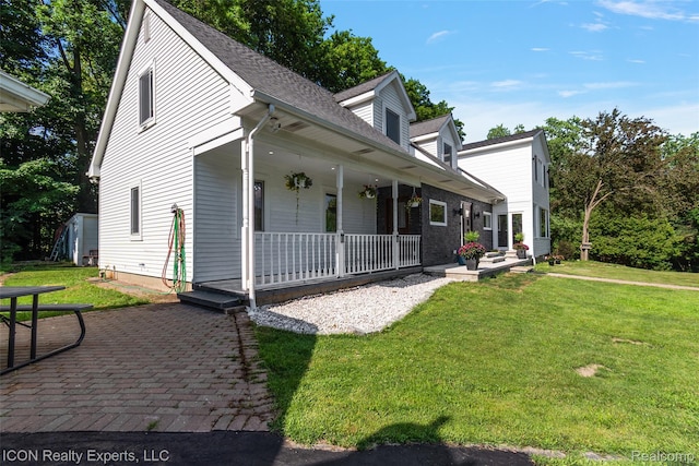 6727 Napier Rd, Plymouth, MI 48170 - new england style home featuring a porch and a front lawn