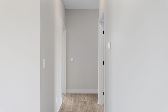 6153 Lake Wind Ave, Holland, MI 49423 - hall featuring light wood-style floors and baseboards