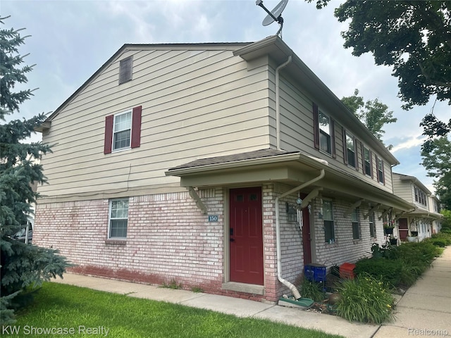 150 Princeton Dr Unit 22, South Lyon, MI 48178 - traditional-style house with brick siding